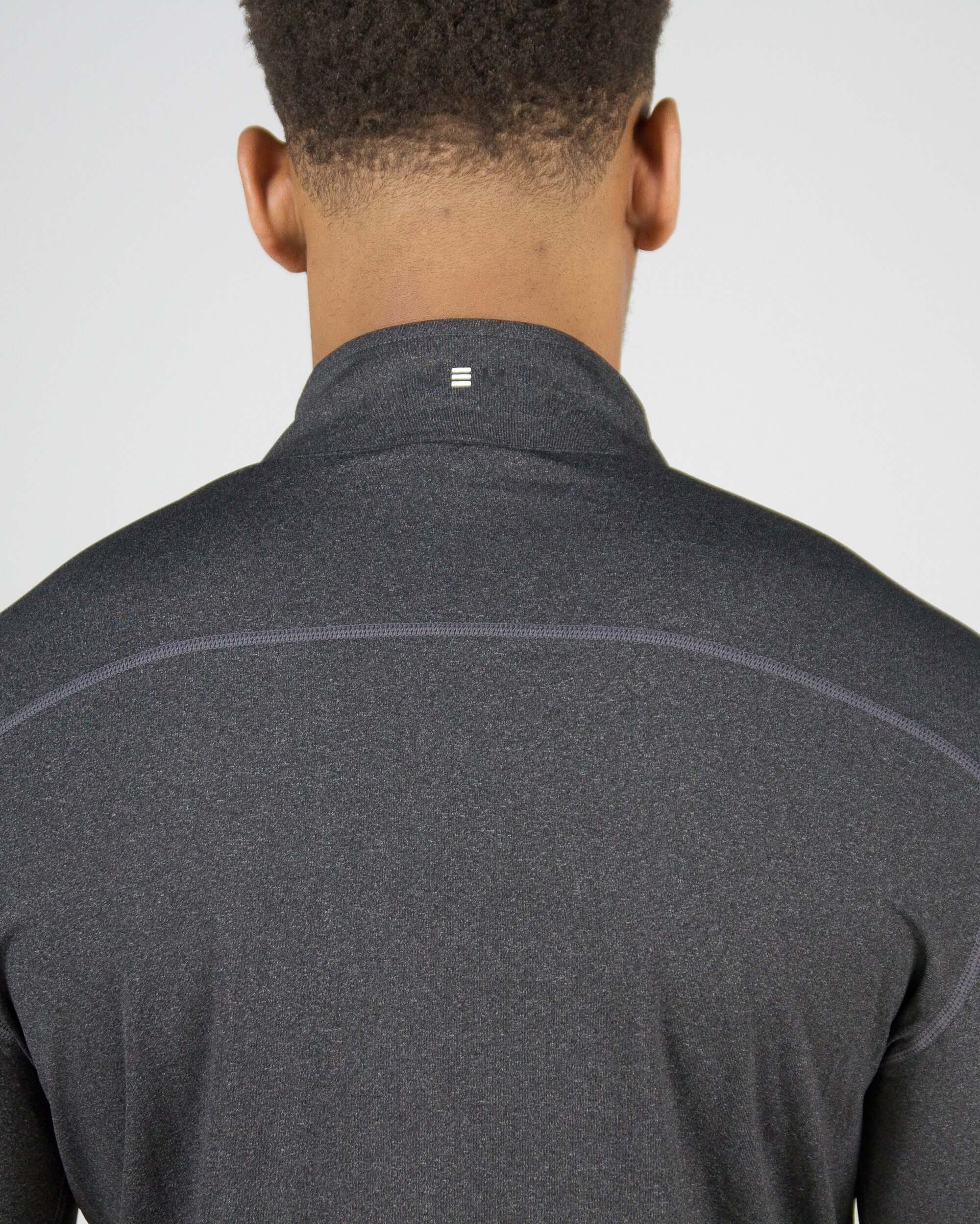 Back view of grey Pinnacle Dry-Fit Long Sleeve Half Zip Training Top, designed for enhanced performance and outdoor training sessions.