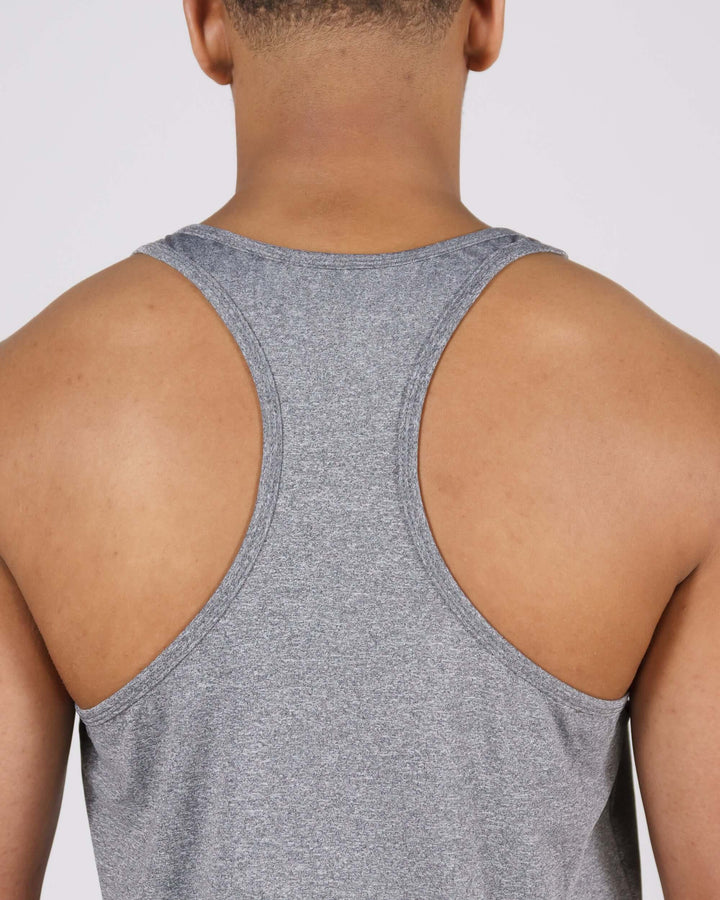 Back view of model wearing grey Pinnacle Slim Fit Tank Top showcasing racerback design and premium fabric texture.